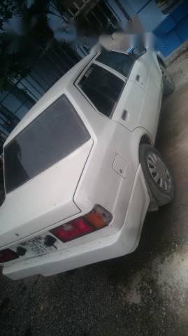 Toyota 86   1982 - Cần bán gấp Toyota 86 đời 1982, màu trắng giá cạnh tranh