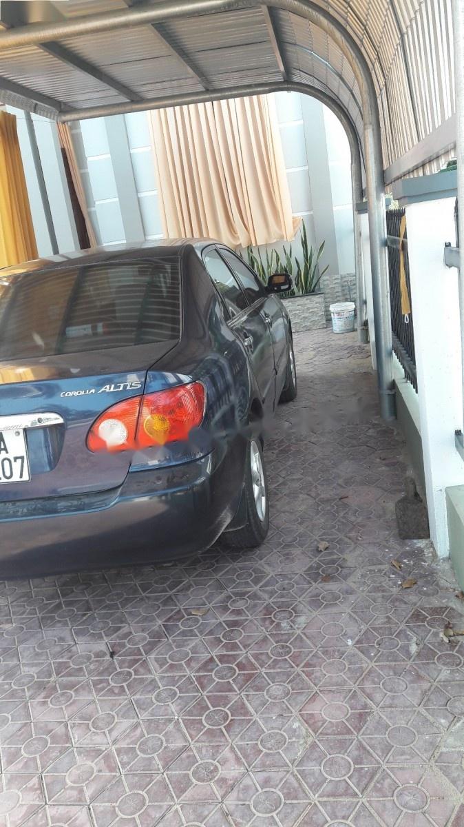 Toyota Corolla Altis 2001 - Bán Toyota Corolla altis đời 2001, màu xanh lam chính chủ, 310tr