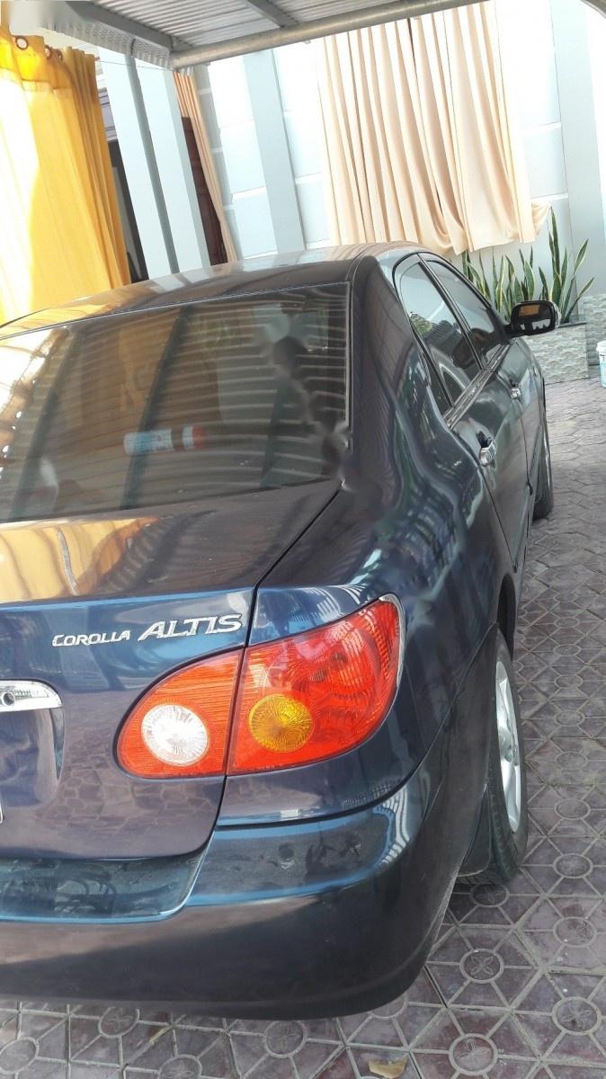 Toyota Corolla Altis 2001 - Bán Toyota Corolla altis đời 2001, màu xanh lam chính chủ, 310tr