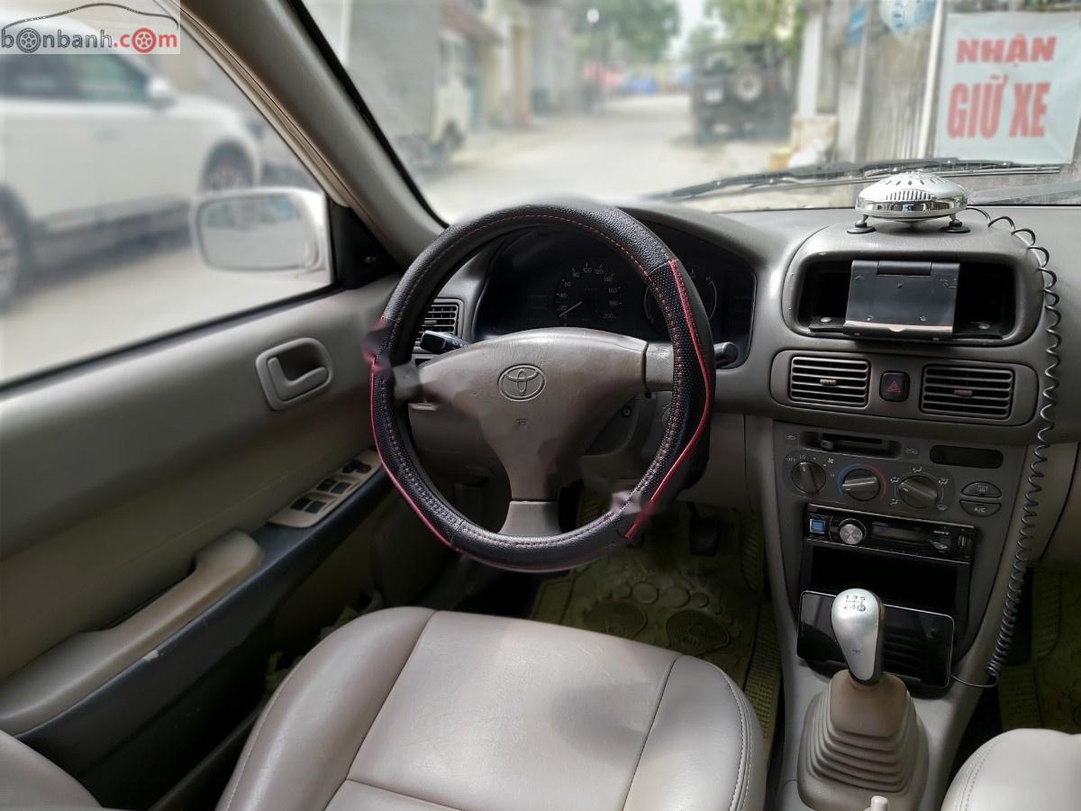 Toyota Corolla 2001 - Bán Toyota Corolla Se dan đời 2001, màu trắng, giá 99tr xe còn mới nguyên