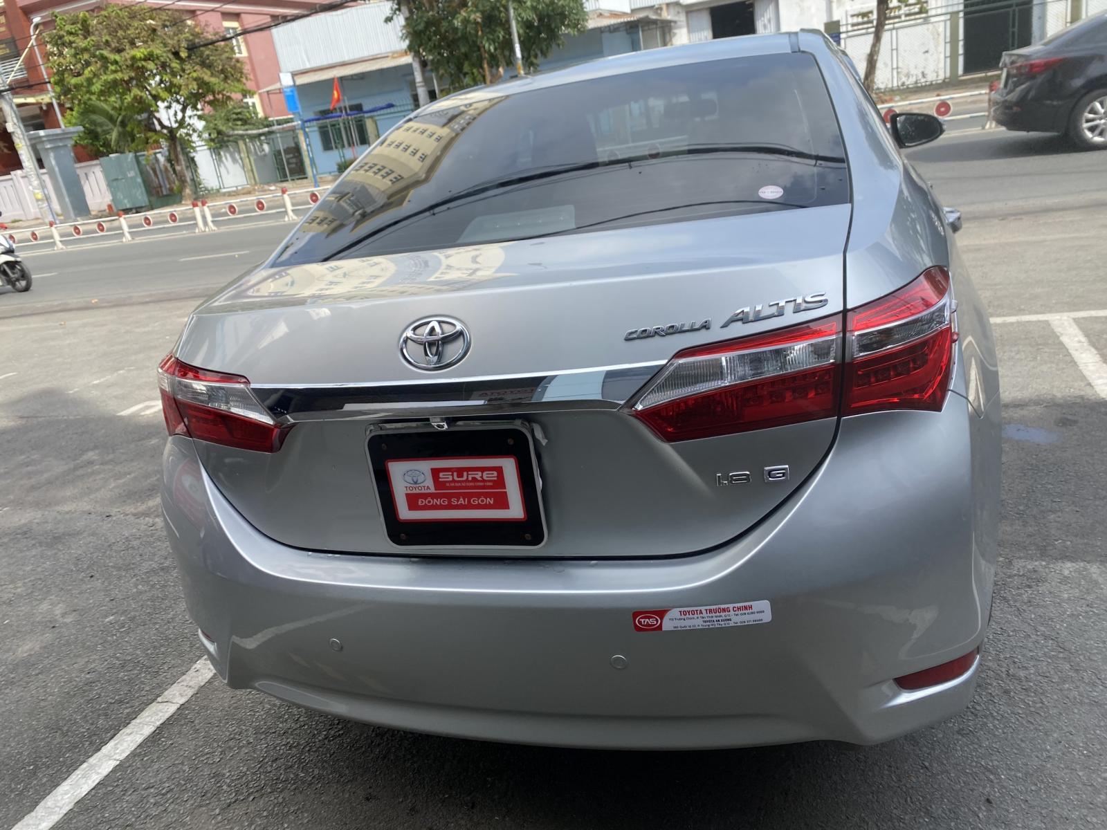 Bán ô tô Toyota Corolla Altis 1.8G đời 2015, màu bạc giá thương lượng