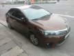 Toyota Corolla Altis 1.8G AT 2016 - Cần bán gấp Toyota Corolla Altis 1.8G AT đời 2016, màu nâu giá 720 triệu tại Hà Nam