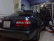 Toyota Corolla Altis 1.6 GLI  1998 - Cần bán lại xe Toyota Corolla Altis 1.6 GLI 1998, màu đen, giá chỉ 200 triệu giá 200 triệu tại Tp.HCM