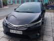 Toyota Corolla Altis  2.0 V  2017 - Bán Toyota Corolla altis năm 2017, màu nâu chính chủ, giá chỉ 860 triệu giá 860 triệu tại Vĩnh Long