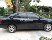 Toyota Corolla Cần bán xe   2002 màu đen 2002 - Cần bán xe Toyota corolla 2002 màu đen giá 145 triệu tại Đắk Lắk