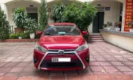 Toyota Corolla 1.3G 2015 - Gia đình cần bán chiếc xe ô tô Toyota Yarit 1.3G màu đỏ số tự động giá 325 triệu tại Hà Nội