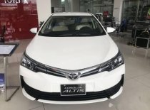 Toyota Corolla Altis 2018 - Bán ô tô Toyota Corolla altis sản xuất 2018, màu trắng, giá chỉ 658 triệu giá 658 triệu tại Kiên Giang