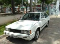 Toyota Corona 1.5MT 1982 - Cần bán gấp Toyota Corona 1.5MT đời 1982, màu trắng, 29 triệu giá 29 triệu tại Bình Dương