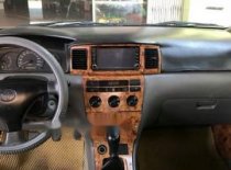 Toyota Corolla Altis   2003 - Cần bán Toyota Corolla altis năm 2003, màu đen, 175 triệu giá 175 triệu tại Bình Định