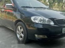 Toyota Corolla Altis 2003 - Bán xe Toyota Corolla altis năm sản xuất 2003, màu đen  giá 200 triệu tại Quảng Nam
