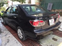 Toyota Corolla Altis 1.8G MT 2005 - Bán Toyota Corolla altis 1.8G MT sản xuất năm 2005, màu đen số sàn, giá chỉ 285 triệu giá 285 triệu tại Quảng Ninh