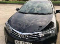 Toyota Corolla Altis 2014 - Cần bán xe Toyota Corolla altis sản xuất năm 2014, màu đen giá 615 triệu tại Ninh Bình