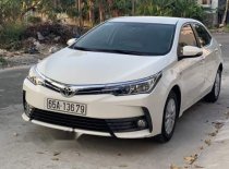 Toyota Corolla Altis 2018 - Lên đời bán xe Toyota Corolla altis năm 2018, màu trắng giá 650 triệu tại Cần Thơ