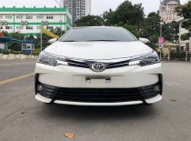 Toyota Corolla 2019 - Cần bán lại xe Toyota Corolla Altis sản xuất 2019, màu trắng, giá tốt giá 598 triệu tại Hà Nội