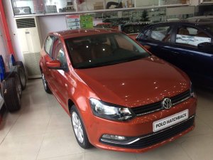 Toyota Yaris AT 2015 - Volkswagen Polo Hatchback 1.6 AT, màu cam, ưu đãi cực sốc, giá chỉ còn 662tr, trả trước 133tr giao xe ngay