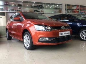 Toyota Yaris AT 2015 - Volkswagen Polo Hatchback 1.6 AT, màu cam, ưu đãi cực sốc, giá chỉ còn 662tr, trả trước 133tr giao xe ngay