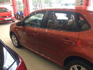 Toyota Yaris AT 2015 - Volkswagen Polo Hatchback 1.6 AT màu cam, nhập khẩu nguyên chiếc, giá đặc biệt 662 triệu