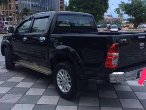 Toyota Hilux 4x2MT 2014 - Cần bán lại xe Toyota Hilux đời 2014, màu đen, nhập khẩu nguyên chiếc, 490tr