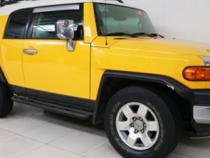 Toyota Fj cruiser   4.0 AT  2007 - Cần bán xe Toyota FJ Cruiser, Sx 2007, màu vàng, nội thất đen, ghế bọc nỉ