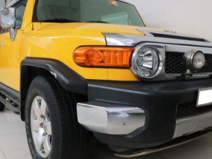 Toyota Fj cruiser   4.0 AT  2007 - Cần bán xe Toyota FJ Cruiser, Sx 2007, màu vàng, nội thất đen, ghế bọc nỉ