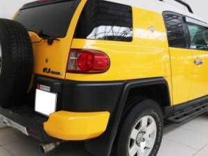 Toyota Fj cruiser   4.0 AT  2007 - Cần bán xe Toyota FJ Cruiser, Sx 2007, màu vàng, nội thất đen, ghế bọc nỉ