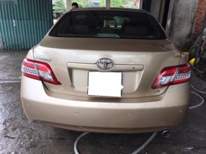 Toyota Camry LE 2010 - Cần bán xe Toyota Camry LE 2010, màu vàng, nhập khẩu