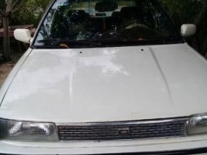 Toyota Corolla 1989 - Cần bán lại xe Toyota Corolla sản xuất 1989, màu trắng, giá 80tr