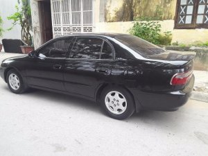 Toyota Corona 1993 - Bán xe Toyota Corona đời 1993, màu đen, nhập khẩu nguyên chiếc xe gia đình