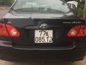 Toyota Corolla Altis 1.8G MT 2001 - Cần bán Toyota Corolla altis 1.8G MT đời 2001, màu đen chính chủ, 190 triệu