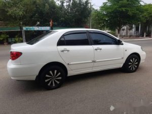 Toyota Corolla 2004 - Bán Toyota Corolla sản xuất năm 2004, màu trắng, giá tốt