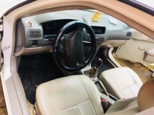 Toyota Corolla 1999 - Cần bán Toyota Corolla sản xuất năm 1999, màu trắng, giá chỉ 125 triệu