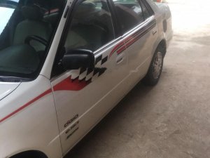 Toyota Corolla 1999 - Cần bán Toyota Corolla sản xuất năm 1999, màu trắng, giá chỉ 125 triệu