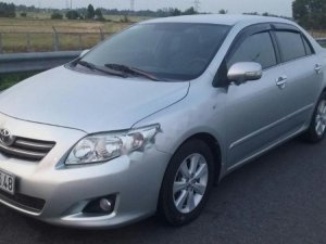 Toyota Corolla Altis G 2009 - Cần bán xe Toyota Corolla altis G đời 2009, màu bạc