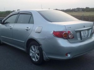 Toyota Corolla Altis G 2009 - Cần bán xe Toyota Corolla altis G đời 2009, màu bạc