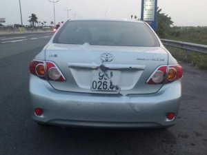 Toyota Corolla Altis G 2009 - Cần bán xe Toyota Corolla altis G đời 2009, màu bạc