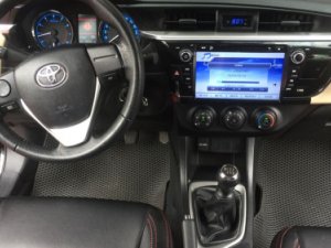 Toyota Corolla  1.8MT 2015 - Bán Toyota Corolla 1.8MT năm 2015, màu đen 