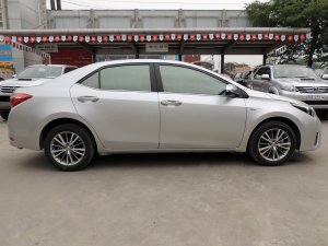 Toyota Corolla 1.8G 2016 - Cần bán Toyota Corolla 1.8G đời 2016, màu bạc