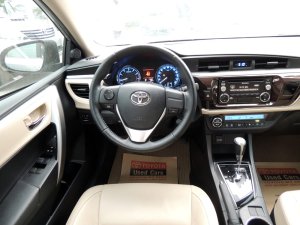 Toyota Corolla 1.8G 2016 - Cần bán Toyota Corolla 1.8G đời 2016, màu bạc