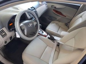 Toyota Corolla Altis 2009 - Bán xe Toyota Corolla altis sản xuất năm 2009, màu đen chính chủ 