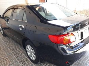 Toyota Corolla Altis 2009 - Bán xe Toyota Corolla altis sản xuất năm 2009, màu đen chính chủ 