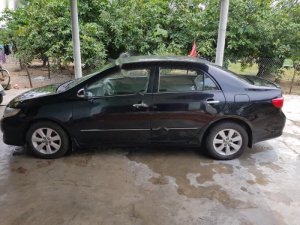 Toyota Corolla Altis 2009 - Bán Toyota Corolla altis sản xuất năm 2009, màu đen số sàn, giá chỉ 385 triệu