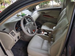 Toyota Corolla Altis 2009 - Bán Toyota Corolla altis sản xuất năm 2009, màu đen số sàn, giá chỉ 385 triệu