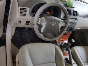 Toyota Corolla Altis 2009 - Bán Toyota Corolla altis sản xuất năm 2009, màu đen số sàn, giá chỉ 385 triệu