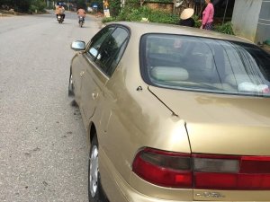 Toyota Corona 1993 - Cần bán xe Toyota Corona đời 1993, màu vàng, nhập khẩu, giá chỉ 86 triệu