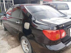 Toyota Corolla Altis   2003 - Cần bán Toyota Corolla altis sản xuất năm 2003, màu đen, nhập khẩu