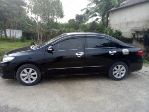 Toyota Corolla Altis AT 2014 - Cần bán Toyota Corolla Altis AT năm 2014, màu đen như mới  