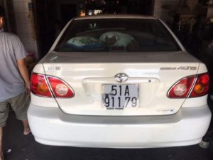 Toyota Corolla 2004 - Cần bán gấp Toyota Corolla 2004, màu trắng