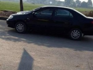 Toyota Corolla Altis   2002 - Cần bán lại xe Toyota Corolla altis sản xuất 2002, màu đen, giá 145tr