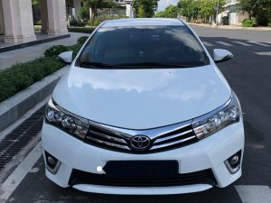 Toyota Corolla Altis 1.8 G 2015 - Bán xe Toyota Corolla altis 1.8 G đời 2015, màu trắng số tự động