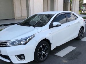 Toyota Corolla Altis 1.8 G 2015 - Bán xe Toyota Corolla altis 1.8 G đời 2015, màu trắng số tự động